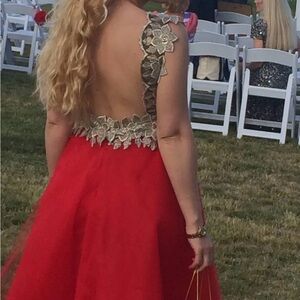 Red Gown with Gold Floral Accents